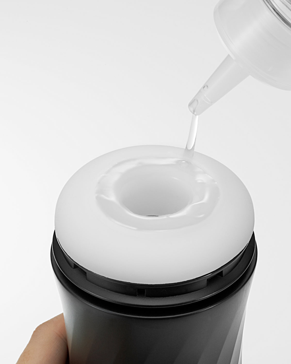 Lotion being applied to the TENGA AIR-TECH TWIST